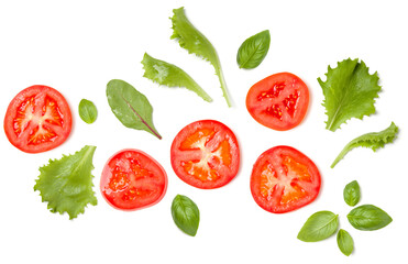 Creative layout made of tomato slices and lettuce salad leaves. Flat lay, top view. Food concept. Vegetables isolated on white background. Food ingredients pattern.