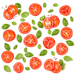 Creative layout made of tomato slices and basil leaves. Flat lay, top view. Food concept....