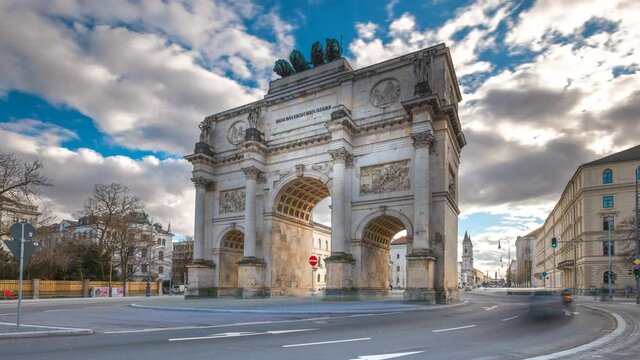 The Siegestor Victory Arch in Munich City time lapse Hyperlapse Video in 4K, Munich Bavaria, Germany. Munich traffic street cars urban scene.