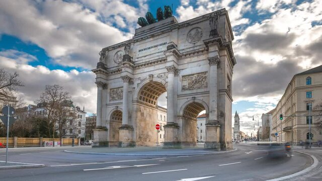 The Siegestor Victory Arch in Munich City time lapse Hyperlapse Video in 4K, Munich Bavaria, Germany. Munich traffic street cars urban scene.