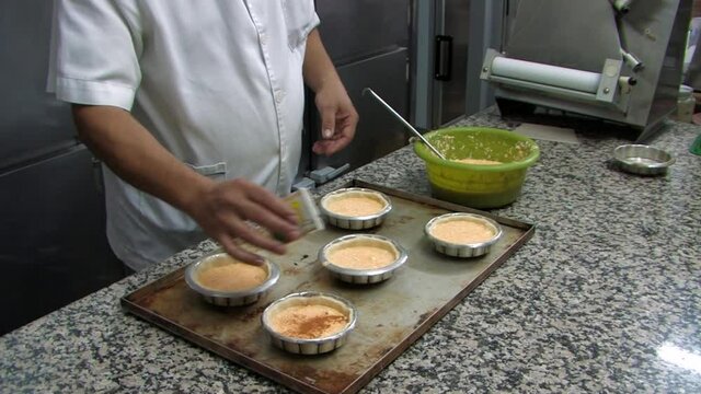Patmos Greece a chef prepares Traditional sweets of the island with special recipes,katsoynia , pougia