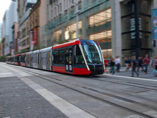 Fototapeta na wymiar Tram moving through George St in Sydney NSW Australia