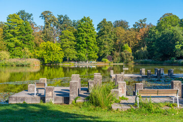 Karlsruhe palace during a sunny day viewed from Schlossgarten park in Germany
