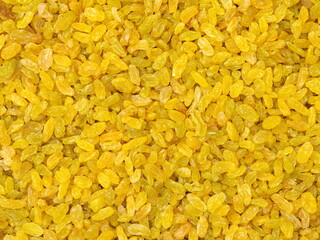 yellow dried grapes background