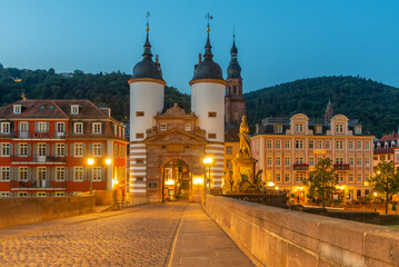 Sunrise view of the old bridge gate in Heidelberg, Germany