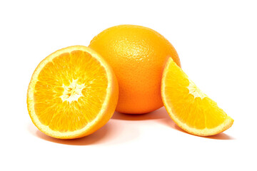 Slieced and whole fresh tropical oranges on white background