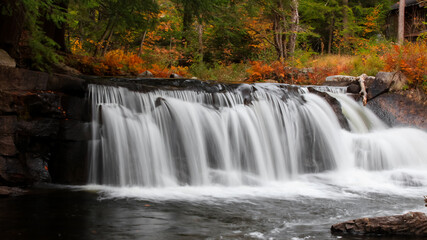 Fototapeta na wymiar Water falls in rural Vermont in autumn time