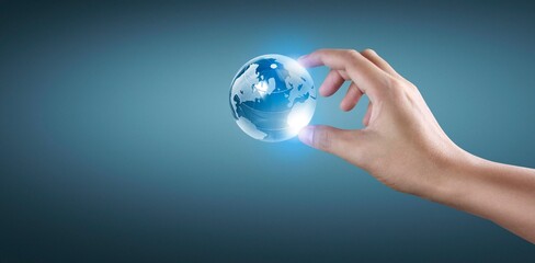 Globe in hand, Earth energy saving concept, image furnished by NASA