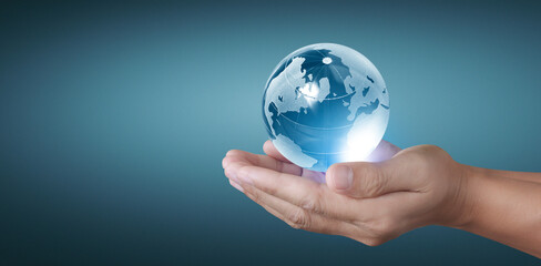 Globe in hand, Earth energy saving concept, image furnished by NASA