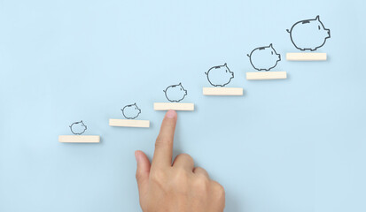 Block stacking as step stair in hand. Business concept