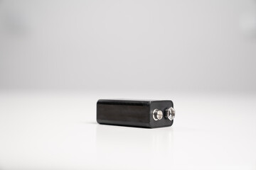 9V battery black color on white background. disposable batteries and accumulators. 