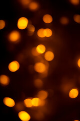 Abstract dark orange dots black background for texture	