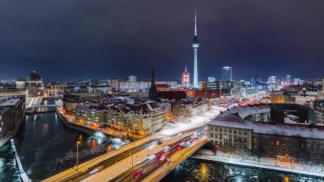 Snowy Night Time Lapse of Berlin Cityscape with TV Tower and Spree River, Berlin, Germany