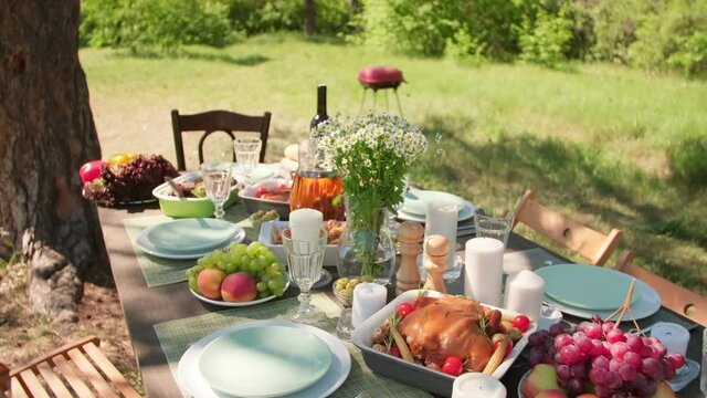 Handheld Zoom Out No People Shot Footage Of Dining Table Prepared For Summer Outdoor Party In Beautiful Park