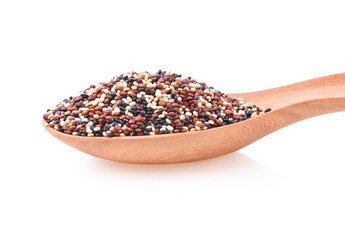 Quinoa seeds in wooden spoon isolated on white background.