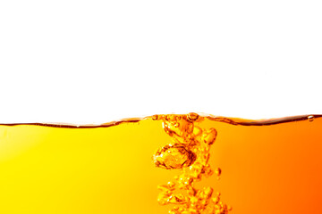 The surface of the orange water ripples looks like beer.