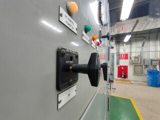 Select focus circuit breaker in Electric room on industrial,   	Rocker switch for start or stop...