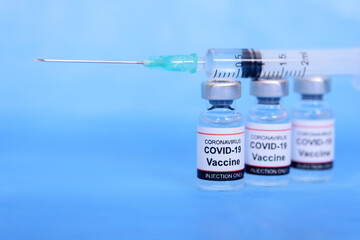 Vaccine and Healthcare Medical concept. Vaccines and syringe on blue background for prevention,immunization and treatment from corona virus infection