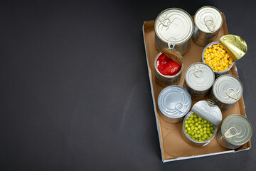 Canned beans, peas, corn, tomatos. Tin cans