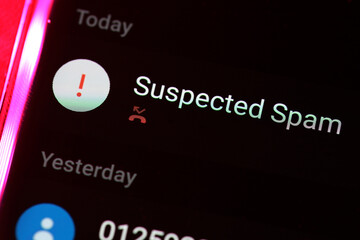 Close up Suspected Spam call on a smartphone. Cybercriminals preying on online users.
