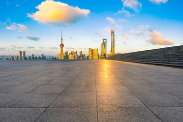 Fototapeta na wymiar Empty square floor and Shanghai skyline with buildings at sunset,China.High angle view.
