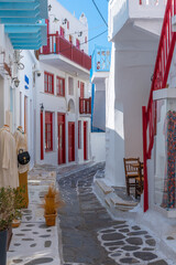 Tourist shops at a narrow street in the old town of Mykonos, Greece