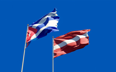 Flags of Latvia and Cuba.