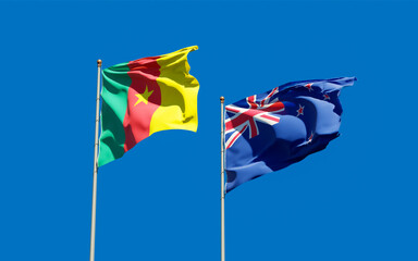 Flags of New Zealand and Cameroon.