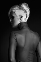 back of young woman with stylish haircut