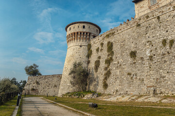Obraz premium View of the Observation tower from the lower tier of the castle of Brescia city. Lombardy. The Falcon of Italy, one of the largest fortified complexes with 75,000 square metres enclosed within walls