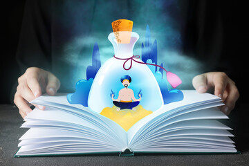 Woman with open book and drawn magic world on dark background