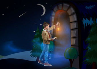 Cute little boy with lantern and magic book near drawn cave in forest at night