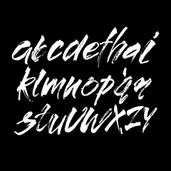 Vector Acrylic Brush Style Hand Drawn Alphabet Font. Calligraphy alphabet on a black background