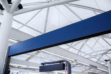 blue color blank sign in the subway terminal, to put your texts or logo