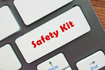 Business concept about Safety Kit with sign on the piece of paper.