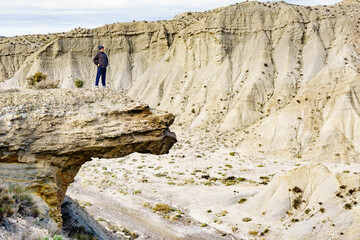 Tourist on Tabernas desert, Spain