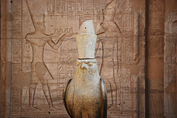 Ancient sculpture of God Horus at Edfu Temple. Egypt