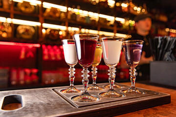 berry tinctures in shorts on the bar