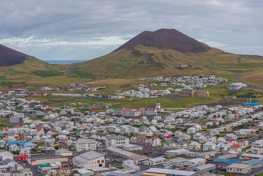 Panorama of Heimaey island with Eldfell and Helgafell volcanos, Iceland