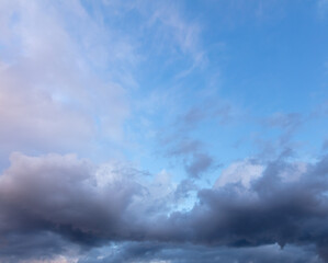 Obraz na płótnie Canvas Rain clouds in the sky at sunset
