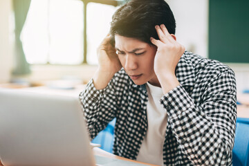 Stressed Student Sitting in the classroom