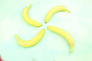 ripe little banana on a white background 