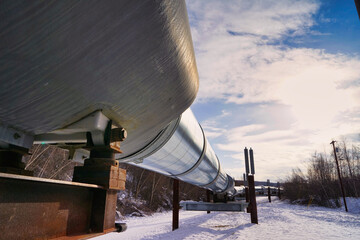 Fototapeta premium Trans-Alaska pipeline system in the snow. March 18, 2016, Alaska. It transports oil from Prudhoe Bay to Valdez, Alaska, USA.