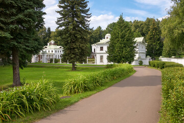 Serednikovo manor in classical style in the Moscow region, a park-manor ensemble of the end of the XVIII - beginning of the XIX century. Main building with wings and a gallery with columns