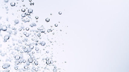 Light bubbles of water isolated over white, macro shot.