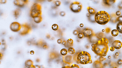 Oil bubbles isolated over white, macro shot.