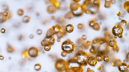 Oil bubbles isolated over white, macro shot.