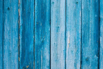 Verwitterte blaue hölzerne Hintergrundbeschaffenheit. Schäbiges blau lackiertes Holz. © ita_tinta_