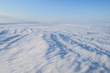 Fototapeta na wymiar Natural abstract background. Snow surface.