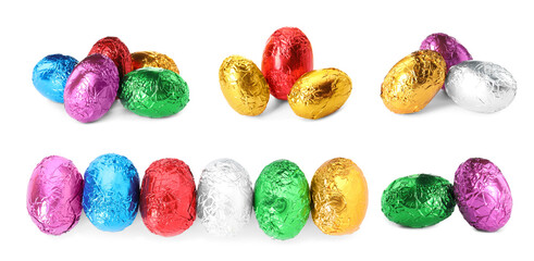 Fototapeta na wymiar Set with chocolate eggs wrapped in bright foil on white background, banner design